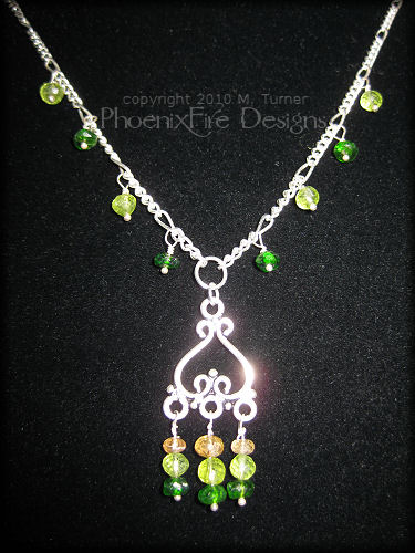 Genuine, AAA quality Chrome Diopside, Micro-faceted Peridot and Imperial Topaz gemstones are featured in this stunning sterling silver necklace.