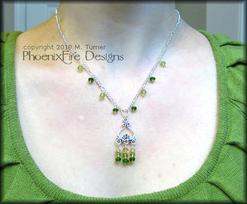 Genuine, AAA quality Chrome Diopside, Micro-faceted Peridot and Imperial Topaz gemstones are featured in this stunning sterling silver necklace.