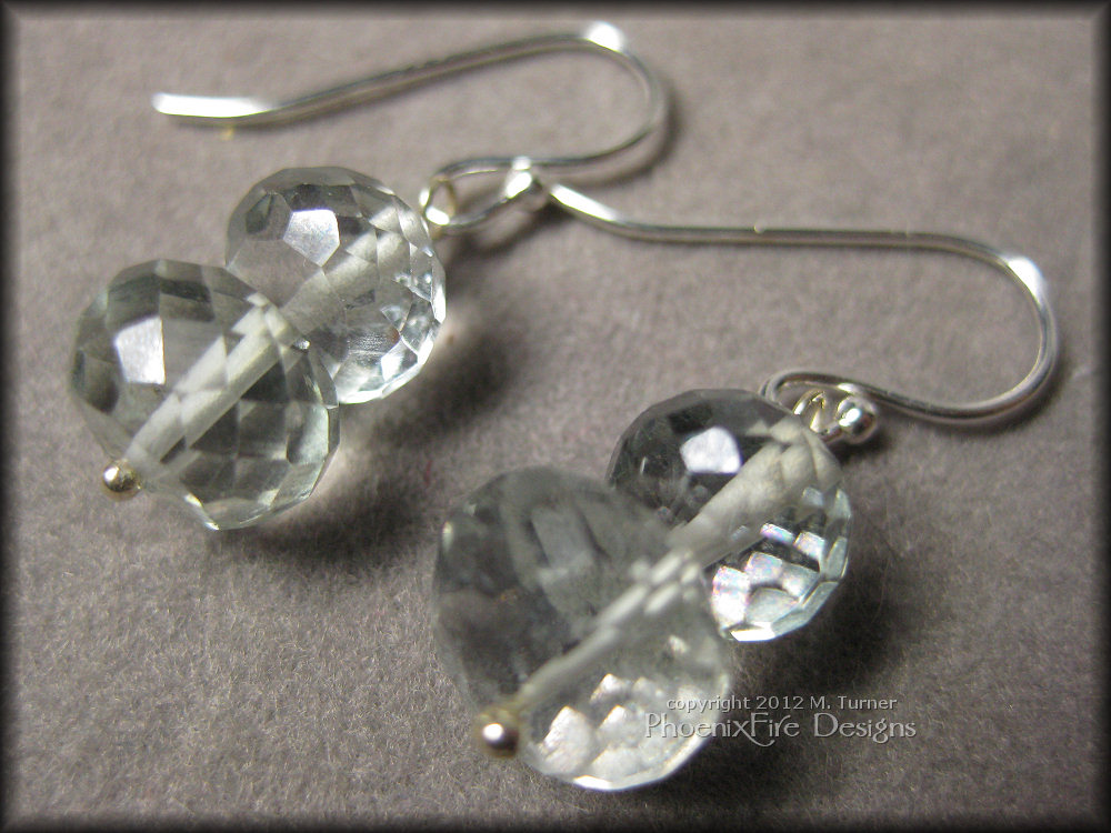 mint-ice-earrings1b Gorgeous microfaceted mystic quartz rondelles in a beautiful pale mint color are stacked on .925 sterling silver pins and dangle from .925 ear wires.