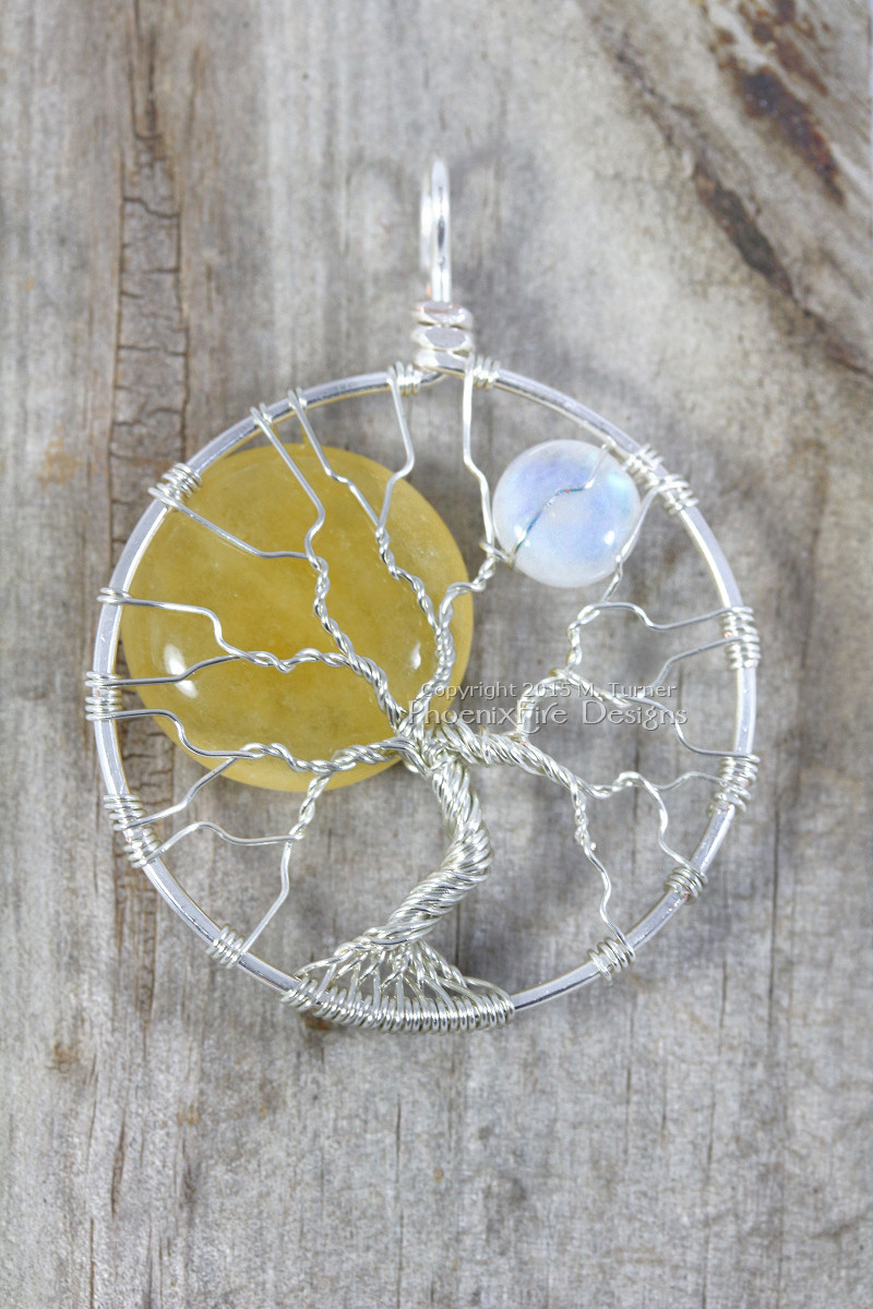 Celestial sun and moon tree of life pendant silver wire wrapped tree handmade yellow jade sol and natural blue flash rainbow moonstone by PhoenixFire Designs on etsy.