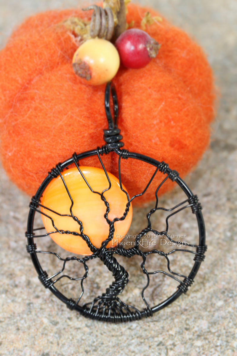 Spooky Halloween Full Moon Tree of Life Pendant with orange harvest moon wire wrapped in black wire by PhoenixFire Designs.