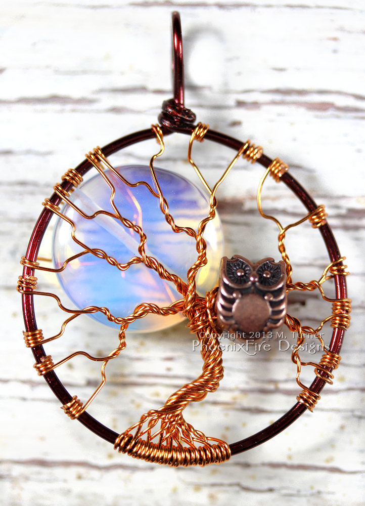 Two tone, mixed metal wire wrapped brown and copper tree of life pendant with large opalite rainbow moonstone full moon and copper owl within the branches makes a spooky Halloween tree of life necklace! By PhoenixFire Designs.