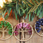 Three 14k gf Tree of Life Pendants handmade by PhoenixFire Designs featuring emerald green Chrome Diopside, an Ombre of shaded Ruby, and deep Blue Sapphire.