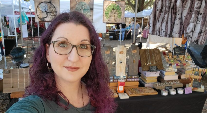 Meet the Maker - May Turner of PhoenixFire Designs in front of her booth.